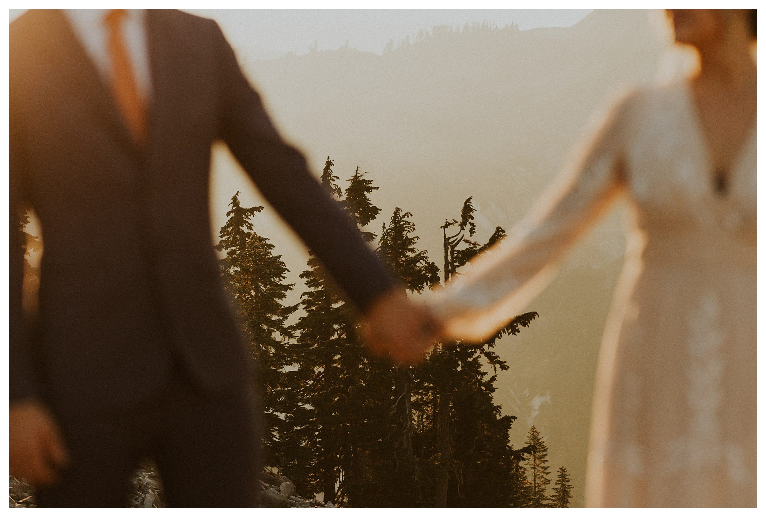 bride and groom holding hands artist point landscape


