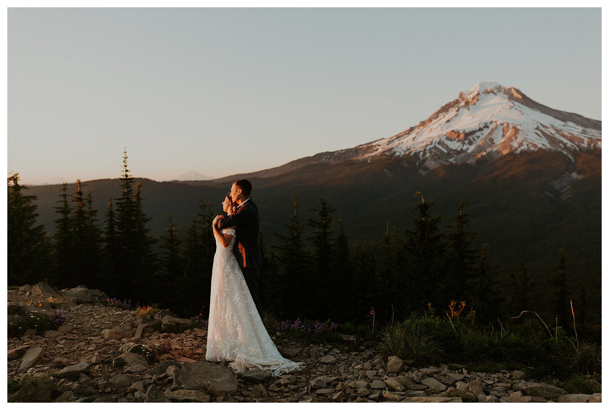 bride and groom hugging mount hood landscape

