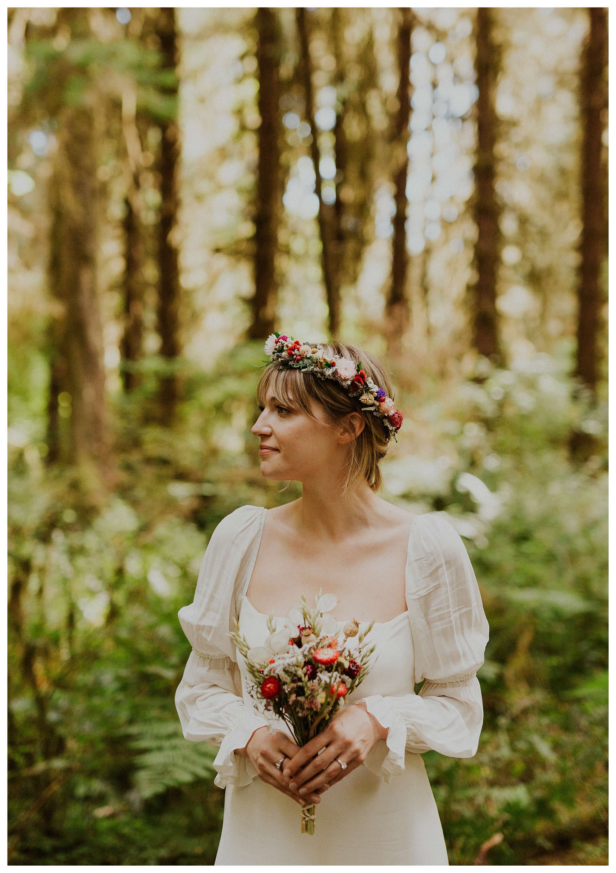 bride holding flowers hoh rainforest
